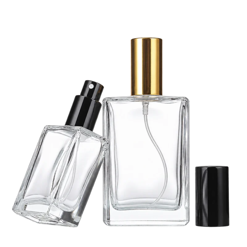 Clear glass spray bottles with gold and black sprayers