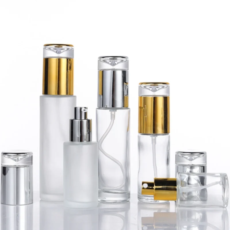 30ml to 100ml glass pump bottles with gold or silver pumps in clear and frosted finishes